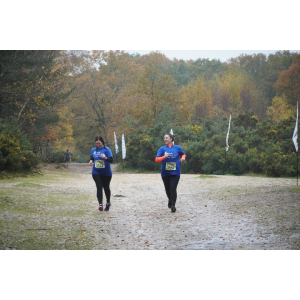 Two runners at Brutal Run wearing HEH Mind tshirts